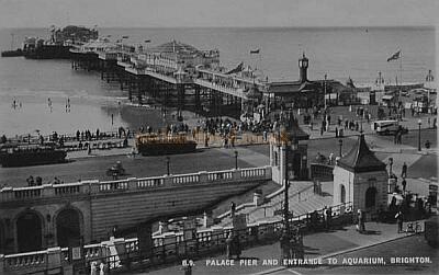 The Palace Pier and entrance to Aquarium, Brighton - From a postcard.