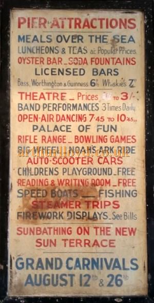 A Heavy Wooden Sign advertising the Pier's Attractions, which was originally situated on the Palace Pier, Brighton, probably in the 1930s - Courtesy Vicky Schildkamp. 