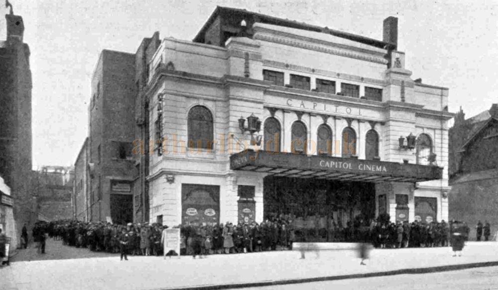 The Capitol Theatre, Forest Hill in its opening year, here showing a massive queue lined up for the showing of the film 'Singing Fool' in April 1929 - From The Bioscope, 24th April 1929.