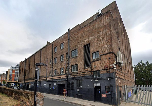 A Google StreetView Image showing the side and rear elevations of the former Forum Theatre, Kentish Town in august 2022 - Click to Interact.