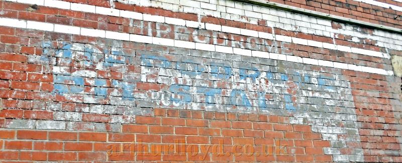Faded signage still showing on the exterior of the Hulme Hippodrome Theatre in March 2016 reads 'Hippodrome Pit Stalls' and underneath this the words '6d Early Doors' - Courtesy Alfred Mason.