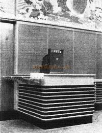 Removable cashier's desk in oak with contrasting ebonised backing.