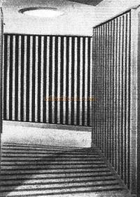 Oak used as vertical protection to service ramp corridor.