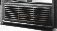 Standard ventilator and heating grille constructed of oak.
