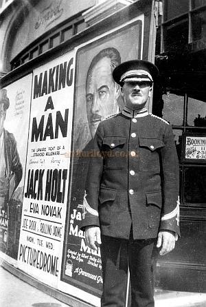An usher standing in front of the Northampton Picturedrome during the run of 'Making A Man' with Jack Holt, which was released in 1922 - Courtesy Alan Ashton