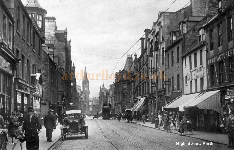 Perth High Street in the 1920s showing a Perth Theatre sign to right of the horse drawn cart - Courtesy Graeme Smith.