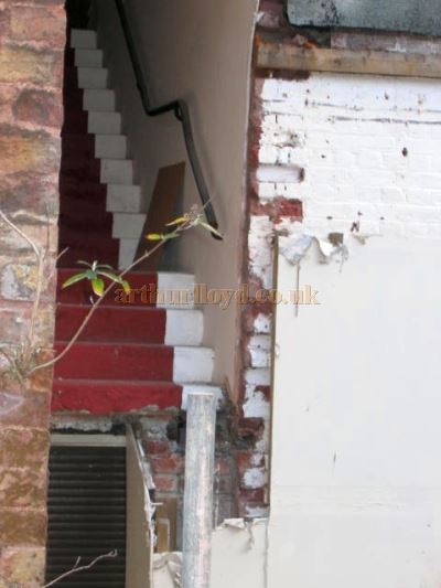 A staircase to nowhere at the rear of the Theatre Royal, Portsmouth after the loss of the Stage House - Courtesy Peter Foulstone.