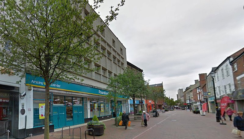 A Google StreetView Image of the site of the former Town Hall and Vint's Electric Palace of Varieties, High Street, Rugby in May 2017 whilst in use as a Poundland Store - Click to Interact.