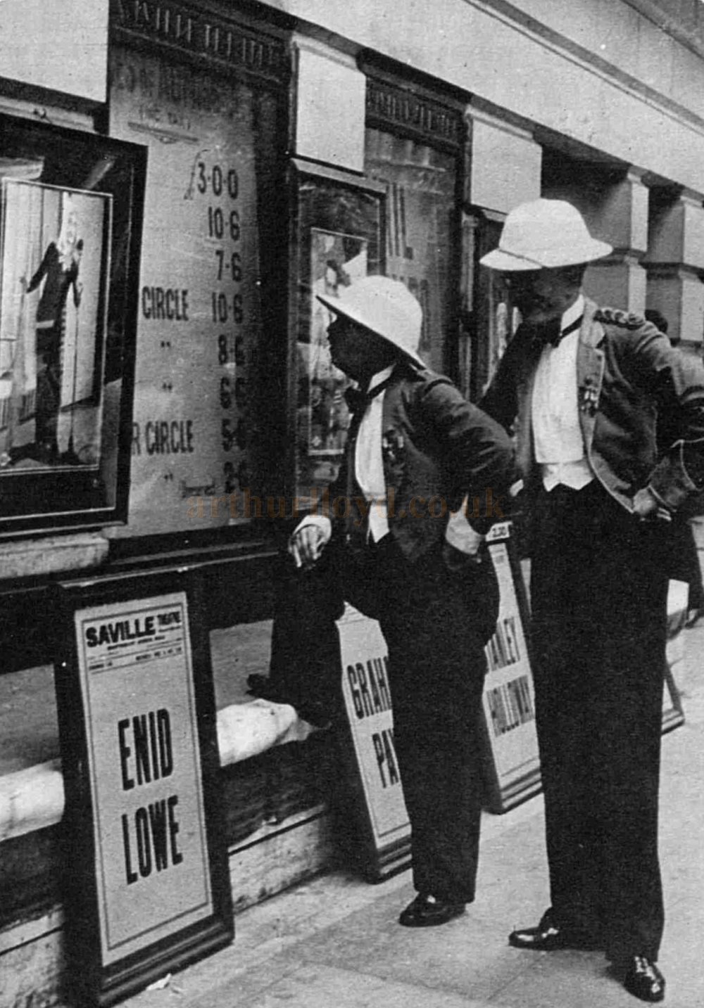 Leslie Henson and Cyril Ritchard staging a publicity photograph outside the Saville Theatre for the reopening of 'Up and Doing' at the Theatre in 1941 - From The Sketch, 4th of June 1941.